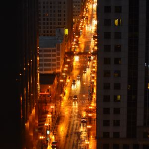 Preview wallpaper city, buildings, road, cars, lights, aerial view, dark