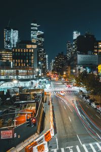 Preview wallpaper city, buildings, road, night, lights, aerial view