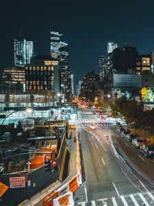 Preview wallpaper city, buildings, road, night, lights, aerial view