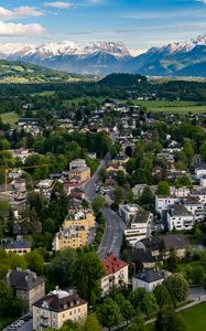 Preview wallpaper city, buildings, road, mountains, aerial view