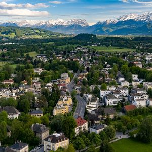 Preview wallpaper city, buildings, road, mountains, aerial view