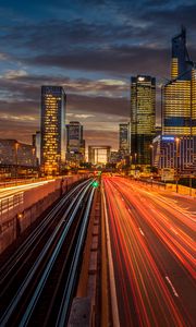 Preview wallpaper city, buildings, road, light, long exposure, twilight