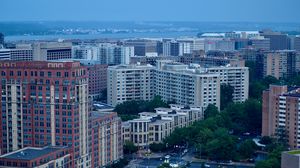 Preview wallpaper city, buildings, road, aerial view, twilight