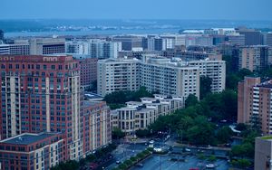Preview wallpaper city, buildings, road, aerial view, twilight