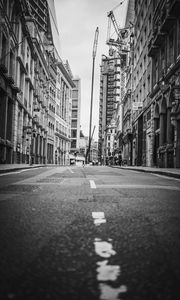 Preview wallpaper city, buildings, road, street, black and white