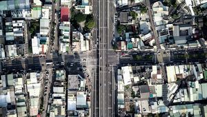 Preview wallpaper city, buildings, roofs, road, aerial view