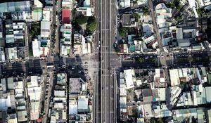 Preview wallpaper city, buildings, roofs, road, aerial view