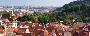 Preview wallpaper city, buildings, roofs, architecture, aerial view, trees