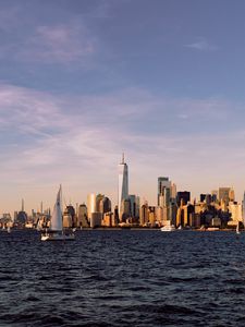 Preview wallpaper city, buildings, sailboat, water