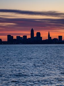 Preview wallpaper city, buildings, silhouettes, coast, water
