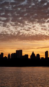 Preview wallpaper city, buildings, silhouettes, water, twilight, dark