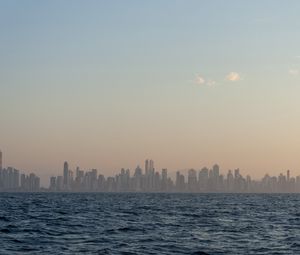 Preview wallpaper city, buildings, silhouettes, water, waves