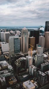 Preview wallpaper city, buildings, skyscraper, road