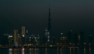 Preview wallpaper city, buildings, skyscraper, water, lights, night