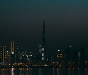 Preview wallpaper city, buildings, skyscraper, water, lights, night