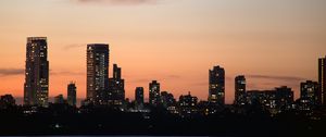 Preview wallpaper city, buildings, skyscrapers, water, evening