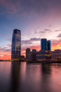 Preview wallpaper city, buildings, skyscrapers, water, reflection