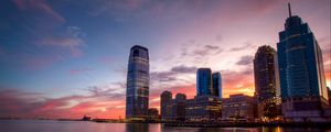Preview wallpaper city, buildings, skyscrapers, water, reflection