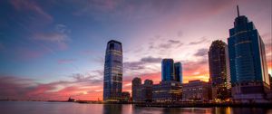 Preview wallpaper city, buildings, skyscrapers, water, reflection