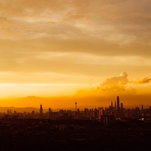 Preview wallpaper city, buildings, skyscrapers, sunset, sky
