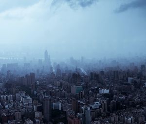 Preview wallpaper city, buildings, skyscrapers, fog, sky