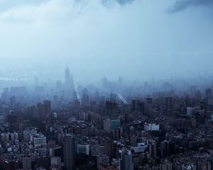 Preview wallpaper city, buildings, skyscrapers, fog, darkness