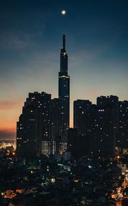 Preview wallpaper city, buildings, skyscrapers, dusk, evening