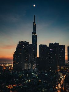 Preview wallpaper city, buildings, skyscrapers, dusk, evening