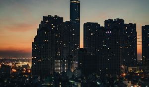 Preview wallpaper city, buildings, skyscrapers, dusk, evening