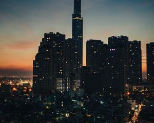 Preview wallpaper city, buildings, skyscrapers, dusk, evening