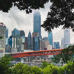 Preview wallpaper city, buildings, skyscrapers, bridge, trees, view