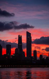 Preview wallpaper city, buildings, skyscrapers, dusk, sunset, dark