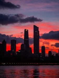 Preview wallpaper city, buildings, skyscrapers, dusk, sunset, dark