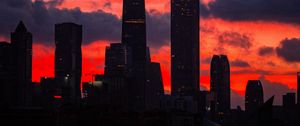 Preview wallpaper city, buildings, skyscrapers, dusk, sunset, dark