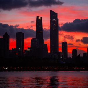 Preview wallpaper city, buildings, skyscrapers, dusk, sunset, dark