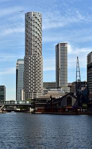 Preview wallpaper city, buildings, skyscrapers, river, water