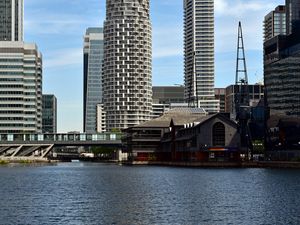 Preview wallpaper city, buildings, skyscrapers, river, water