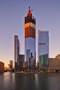 Preview wallpaper city, buildings, skyscrapers, water