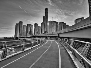 Preview wallpaper city, buildings, skyscrapers, walkway, black and white