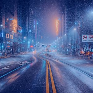 Preview wallpaper city, buildings, street, road, snow, winter