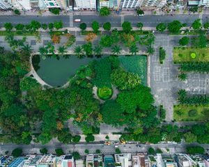 Preview wallpaper city, buildings, street, park, trees, aerial view