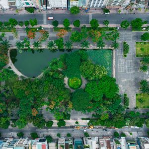 Preview wallpaper city, buildings, street, park, trees, aerial view