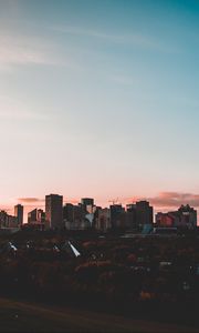 Preview wallpaper city, buildings, sunset, sky