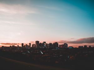 Preview wallpaper city, buildings, sunset, sky