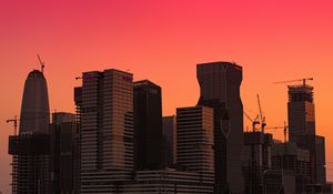 Preview wallpaper city, buildings, sunset, gradient