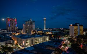 Preview wallpaper city, buildings, tower, lights, twilight, aerial view