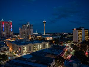 Preview wallpaper city, buildings, tower, lights, twilight, aerial view