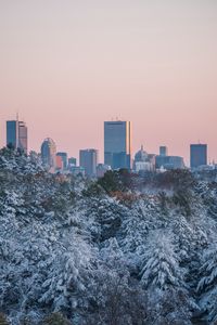 Preview wallpaper city, buildings, trees, snow, view