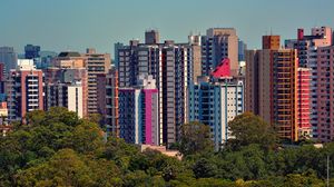Preview wallpaper city, buildings, trees, aerial view, colorful