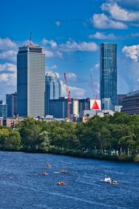 Preview wallpaper city, buildings, trees, river, aerial view
